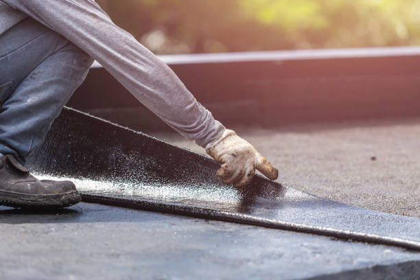 Professional Basement Waterproofing technician working in Flushing, MI